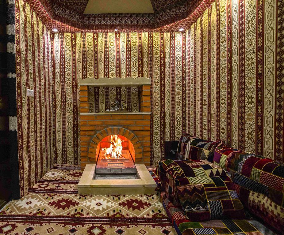 Rest Night Serviced Apartments- Alhamra Riyadh Eksteriør bilde A majlis with a fireplace